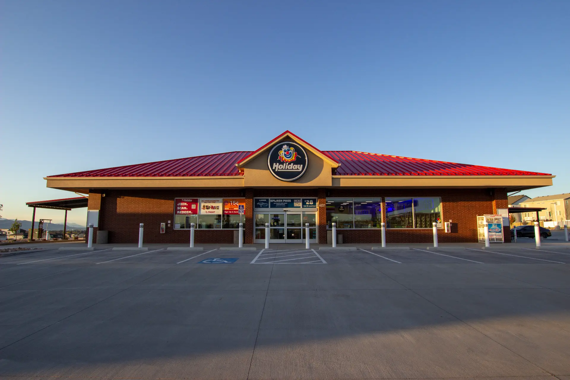 Holiday Oil storefront with signature red roof